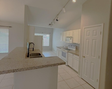 1720 E Flint Street - Photo Thumbnail 2