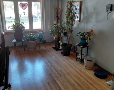 5829 W 63rd Place - Photo Thumbnail 2