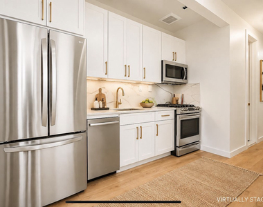 915 St Johns Place - Photo Thumbnail 1