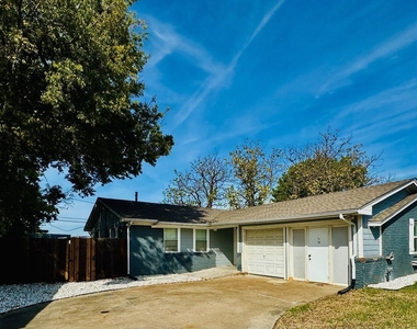 1002 Mardi Gras Lane - Photo Thumbnail 1