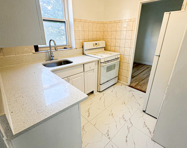 85-11 34th Avenue - Photo Thumbnail 2