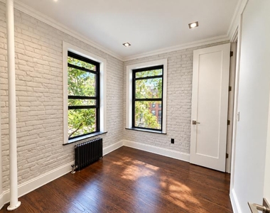 410 East 13th Street - Photo Thumbnail 2
