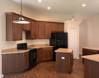13115 Tom Morris Drive - Photo Thumbnail 2