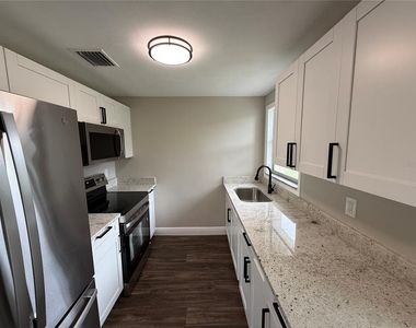 11542 90th Street - Photo Thumbnail 2
