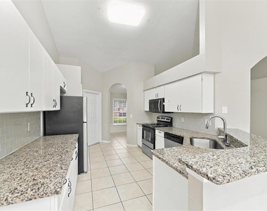 14428 Peppermill Trail - Photo Thumbnail 4
