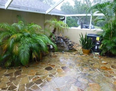 9411 W Park Village Drive - Photo Thumbnail 3