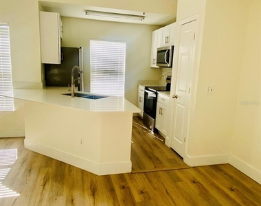 8957 Lee Vista Boulevard - Photo Thumbnail 2