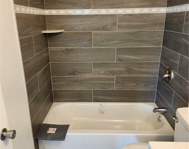 1421 E 123rd - Photo Thumbnail 2