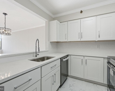10101 Grosvenor Place - Photo Thumbnail 4