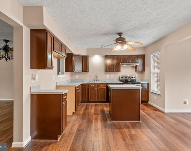225 Woodland Green Way - Photo Thumbnail 4
