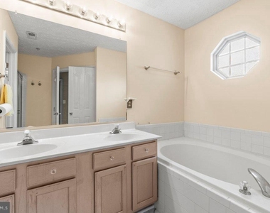 225 Woodland Green Way - Photo Thumbnail 37