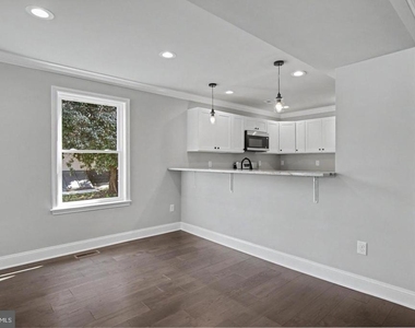 7501 Riddle Avenue - Photo Thumbnail 10