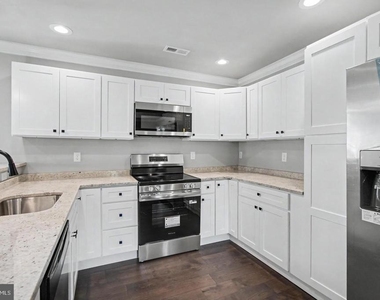 7501 Riddle Avenue - Photo Thumbnail 14