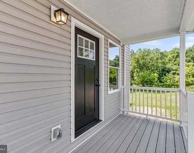 7501 Riddle Avenue - Photo Thumbnail 3