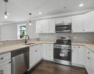 7501 Riddle Avenue - Photo Thumbnail 15
