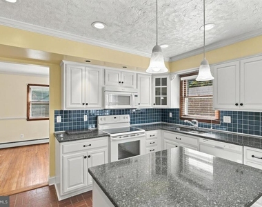 8325 Woodland Road - Photo Thumbnail 9