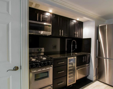 W 53RD ST. - Photo Thumbnail 3