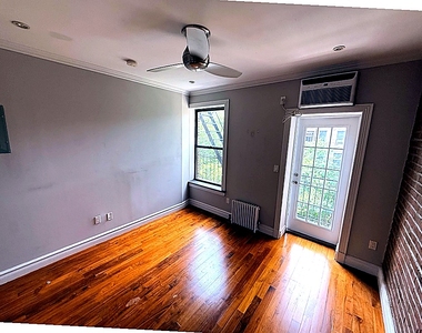 West 21st Street — 1 Bed - Photo Thumbnail 1