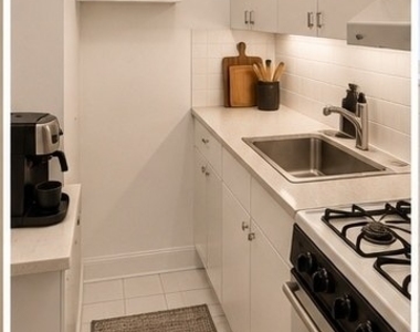 E 39th St - Photo Thumbnail 2