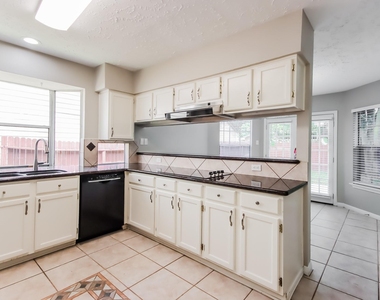 5414 Garden Village Drive - Photo Thumbnail 4