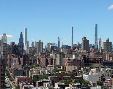 E 110th St - Photo Thumbnail 18