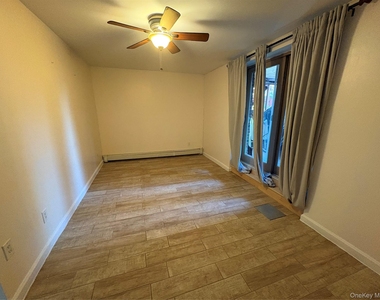 61-33 69th St - Photo Thumbnail 1
