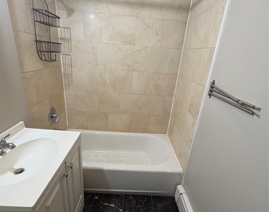 61-33 69th St - Photo Thumbnail 5