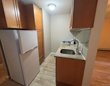 61-33 69th St - Photo Thumbnail 3