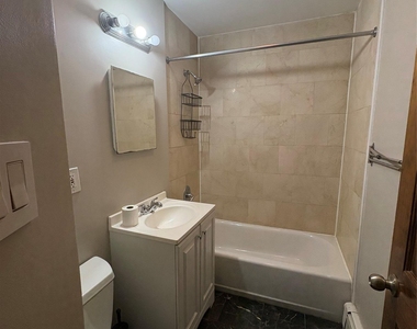 61-33 69th St - Photo Thumbnail 4