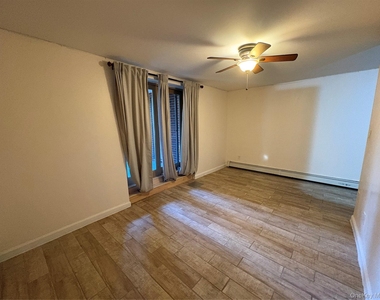 61-33 69th St - Photo Thumbnail 2
