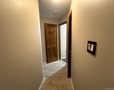 61-33 69th St - Photo Thumbnail 8