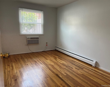 210-15 41st Avenue - Photo Thumbnail 5