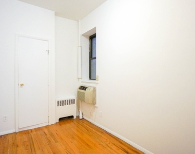 319 E 25th Street - Photo Thumbnail 4