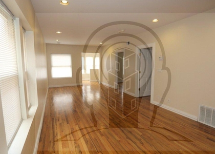 4 Bedrooms, Belmont Gardens Rental in Chicago, IL for $2,000 - Photo 1