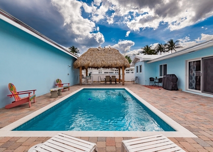 4 Bedrooms, Poinsettia Gardens Rental in Miami, FL for $7,700 - Photo 1