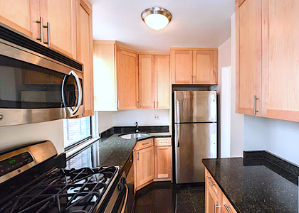 East 77 ST - Photo 1