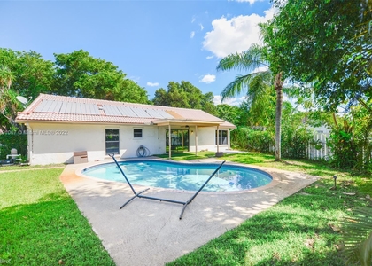 4 Bedrooms, Forest Hills Rental in Miami, FL for $3,900 - Photo 1