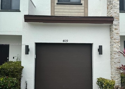 409 Ne 208th Ter - Photo 1