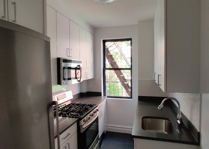 6th Ave/W 11 - Photo 1