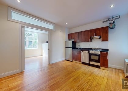 207-209 W 11th Street - Photo 1