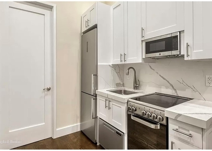 244 W 22nd St - Photo 1