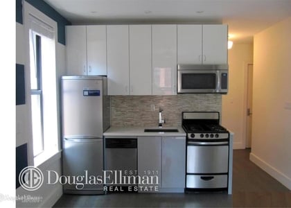 48 W 138th St - Photo 1
