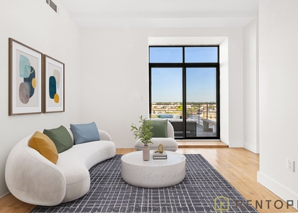 55-27 Myrtle Avenue - Photo 1