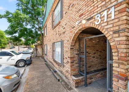 311 E 31st St - Photo 1