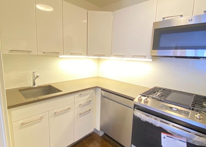 220 E 63rd St - Photo 1