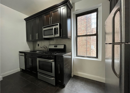 414 W 44th St - Photo 1