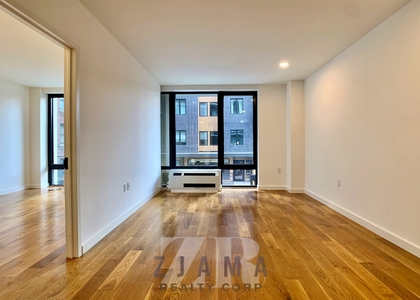 East 19th St x Tennis Ct  - Photo 1