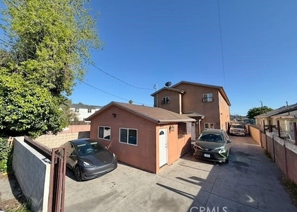 227 1/2 E 84th - Photo 1