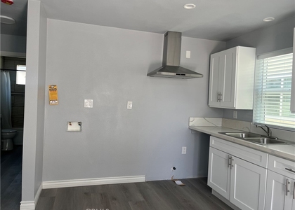 1215 1/2 W104th - Photo 1