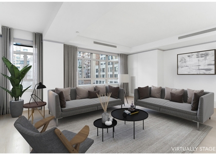 21 E 61st St - Photo 1